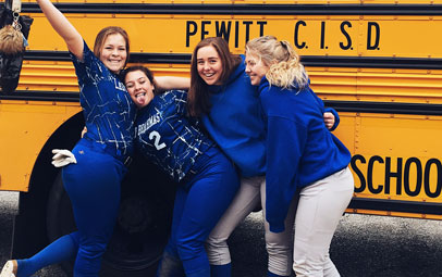 group-posing-school-bus-tab1-406x255